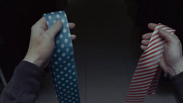 Video Reference: Blue, Hand, Tie, Arm, Finger, Design, Textile, Pattern, Nail, Gesture