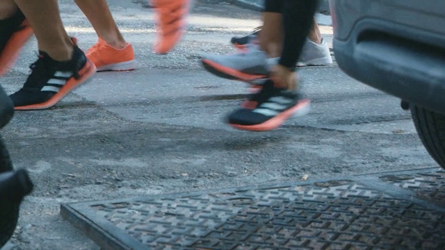 Video Reference: Human leg, Leg, Footwear, Road surface, Asphalt, Shoe, Sidewalk, Ankle, Foot
