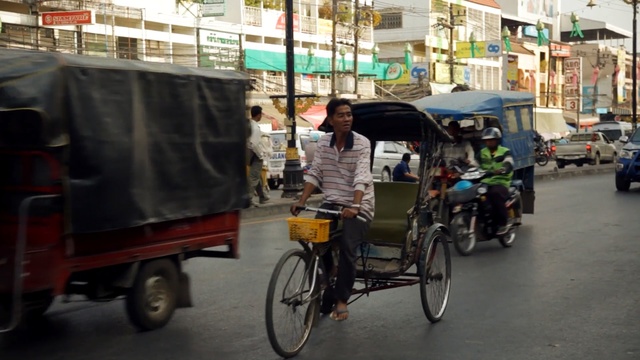 Video Reference: Land vehicle, Vehicle, Mode of transport, Rickshaw, Transport, Motor vehicle, Cart, Snapshot, Traffic, Street