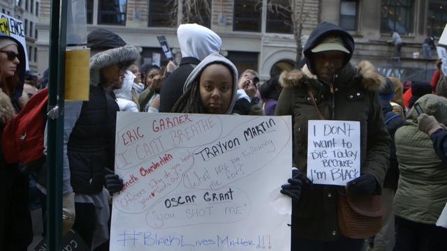 Video Reference: protest, event, demonstration, crowd, street, public event, Person