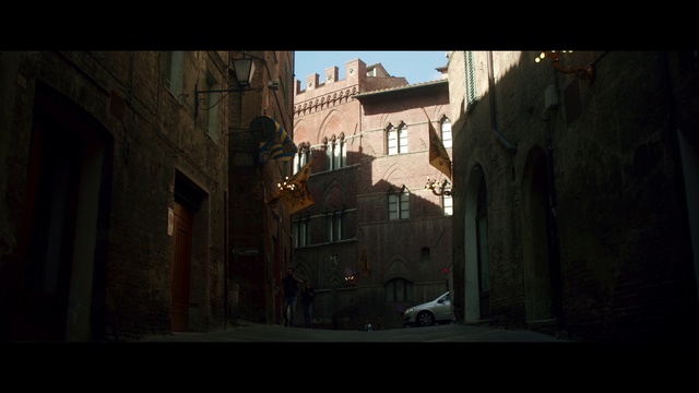 Video Reference: Alley, Street, Town, Sky, Neighbourhood, Road, Infrastructure, Architecture, Atmosphere, Screenshot