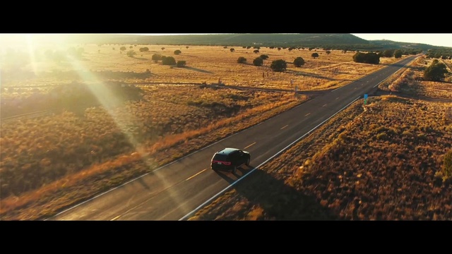 Video Reference: Road, Mode of transport, Horizon, Sky, Morning, Ecoregion, Vehicle, Sunlight, Landscape, Highway