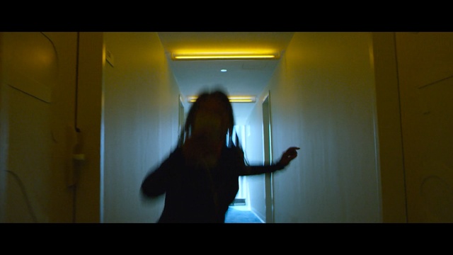 Video Reference: black, yellow, darkness, light, room, snapshot, lighting, girl, standing, shadow