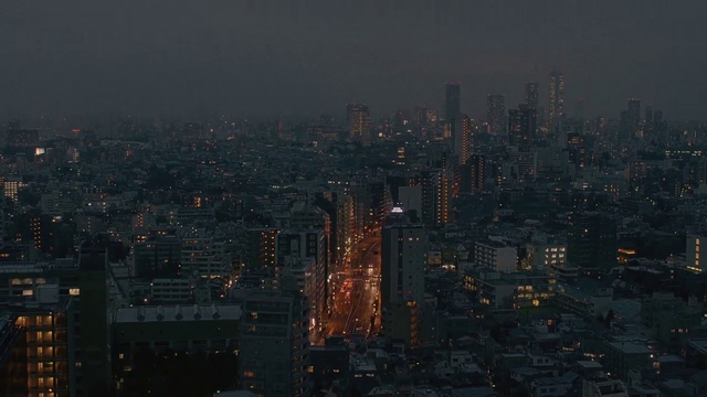 Video Reference: Metropolitan area, Cityscape, Metropolis, Urban area, City, Skyline, Human settlement, Atmospheric phenomenon, Tower block, Night