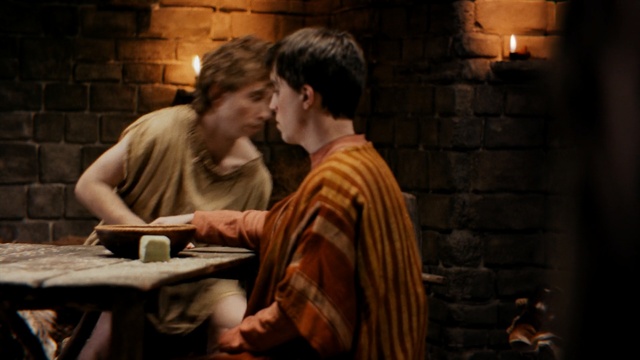 Video Reference: interaction, temple, human behavior, darkness, scene, conversation, Person