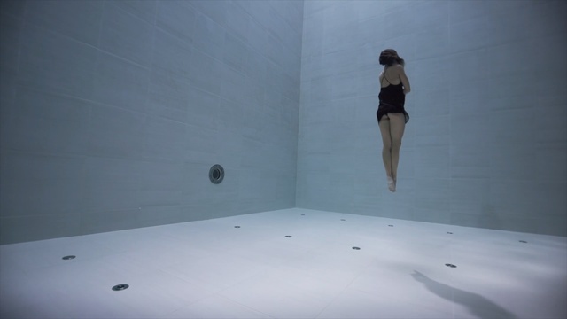 Video Reference: white, black, photograph, wall, light, sky, floor, shadow, line, daylighting, Person