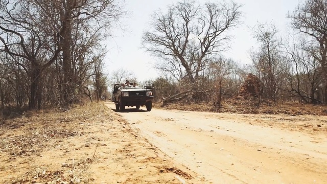 Video Reference: Dirt road, Vehicle, Off-roading, Road, Transport, Off-road vehicle, Mode of transport, Car, Infrastructure, Tree