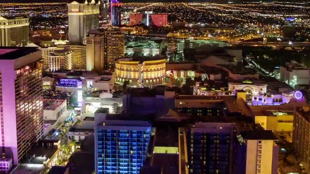 Video Reference: Cityscape, City, Metropolitan area, Metropolis, Urban area, Downtown, Human settlement, Night, Skyscraper, Mixed-use
