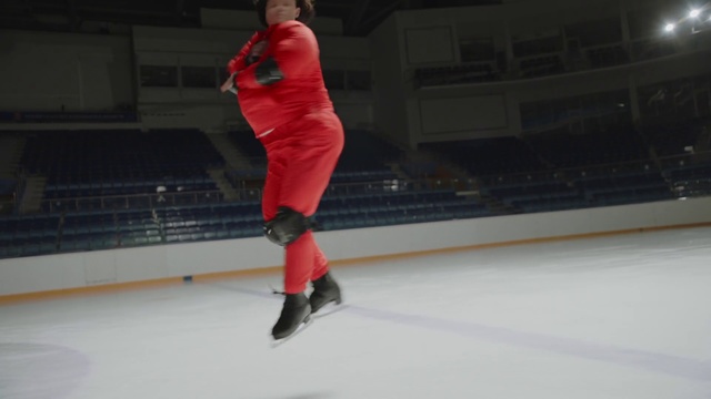 Video Reference: Red, Ice rink, Ice skating, Recreation, Sports, Sports equipment, Skating, Player, Competition event, Games