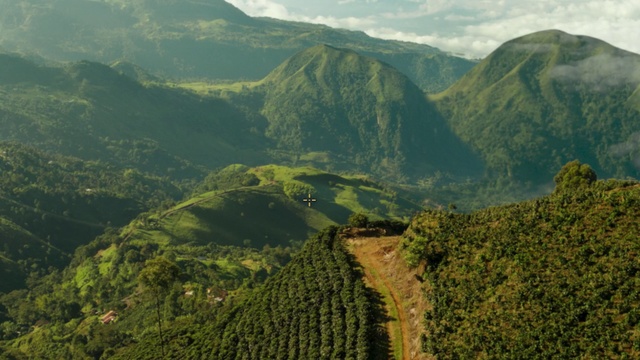 Video Reference: Mountainous landforms, Highland, Mountain, Hill station, Nature, Hill, Vegetation, Ridge, Wilderness, Natural landscape, Outdoor, Green, Background, View, Surrounded, Field, Large, Grazing, Snow, Grassy, Tall, Standing, White, Train, Landscape, Cloud, Plant, Valley, Sky, Hillside, Lush