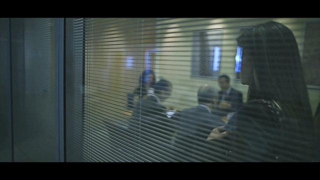 Video Reference: blue, black, photograph, green, darkness, mode of transport, light, structure, urban area, architecture, Person