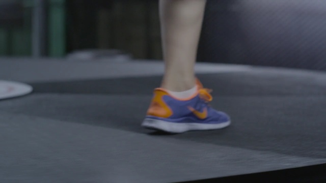Video Reference: footwear, shoe, yellow, leg, foot, outdoor shoe, floor, human leg, recreation, flooring