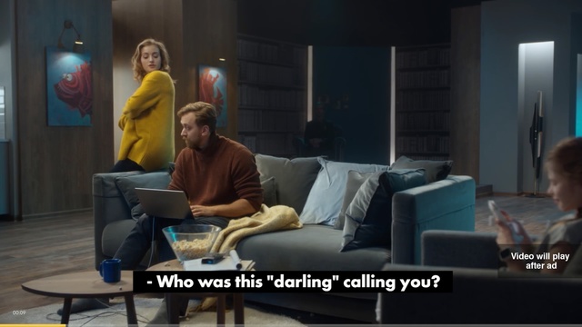 Video Reference: Adaptation, Sitting, Room, Conversation, Furniture, Screenshot, Media, Couch, Interior design, Photo caption, Person