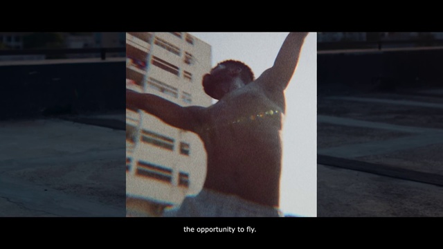 Video Reference: Gesture, Flash photography, Font, Tints and shades, Display device, Visual arts, Rectangle, Wood, Shadow, Elbow