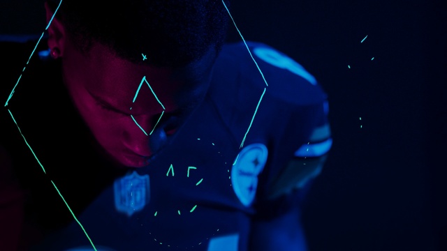 Video Reference: blue, black, darkness, light, audio equipment, audio, lighting, night, neon, event, Person