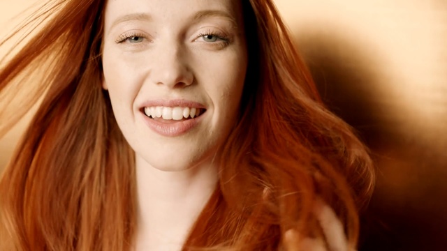 Video Reference: Hair, Face, Skin, Facial expression, Smile, Chin, Eyebrow, Beauty, Hairstyle, Red hair