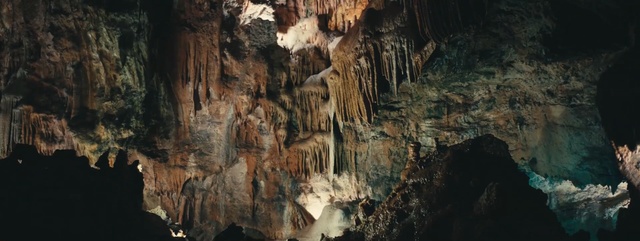 Video Reference: cave, stalactite, formation, stalagmite, speleothem, caving, geology, rock, karst landforms, Person