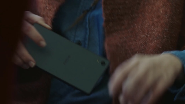 Video Reference: blue, finger, hand, electronic device, close up, arm, textile, material, angle, gadget