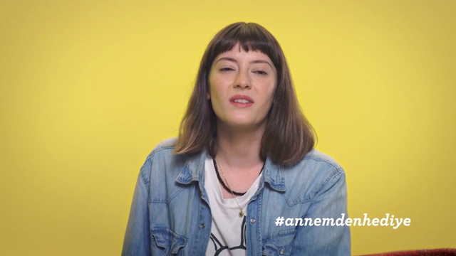 Video Reference: Face, Hair, Yellow, Head, Chin, Cheek, Long hair, Mouth, Jeans, Smile