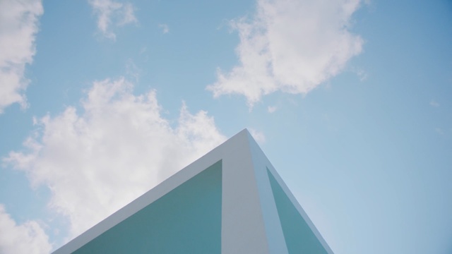 Video Reference: Daytime, Blue, Sky, Architecture, Cloud, Line, Skyscraper, Cumulus, Facade, Building