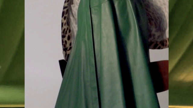 Video Reference: Clothing, Green, Dress, Formal wear, Outerwear, Fashion, Textile, Gown, Sleeve, Haute couture