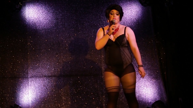 Video Reference: performance, singer, stage, singing, entertainment, performance art, model, thigh, human body, darkness, Person