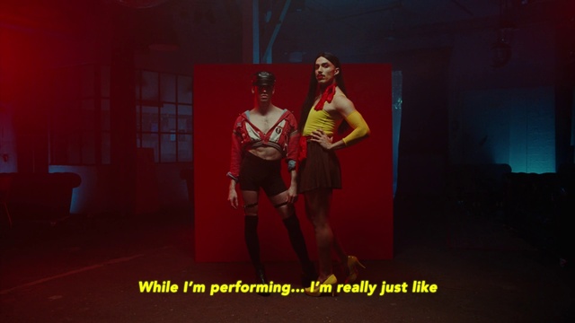 Video Reference: Fashion design, Art, Performing arts, Event, Magenta, Entertainment, Costume design, Fictional character, Font, Choreography