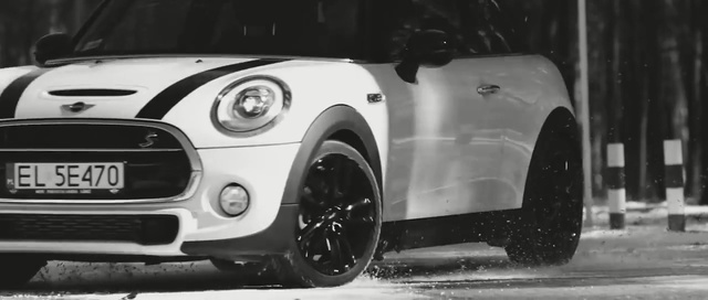 Video Reference: Land vehicle, Vehicle, Car, Mini, Mini cooper, Motor vehicle, Automotive tire, Wheel, Automotive design, Rim, Person