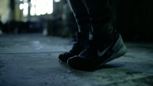 Video Reference: Black, Footwear, White, Blue, Shoe, Leg, Darkness, Human leg, Atmosphere, Ankle