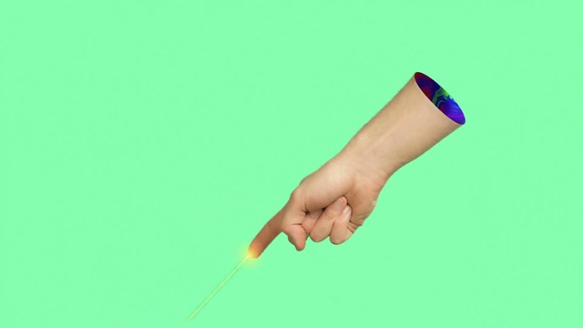 Video Reference: Finger, Green, Hand, Arm, Thumb, Wrist, Gesture, Nail, Joint, Human leg, Person, Woman, Holding, Lady, Cutting, Ball, Large, Wearing, Shirt, Young, Smiling, White, Female, Standing, Uniform, Kite, Using, Cut, Blue, Cake, Flying, Water, Yellow, Player, Board, Court, Room, Air, Watch