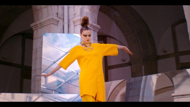 Video Reference: yellow, dress, fashion, screenshot, fun, costume, girl, world, Person