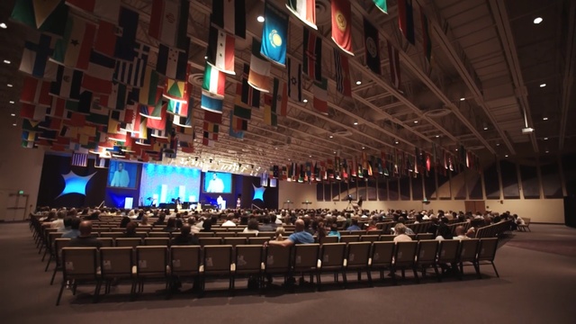 Video Reference: function hall, auditorium, lighting, stage, convention center, performing arts center, ceremony, Person