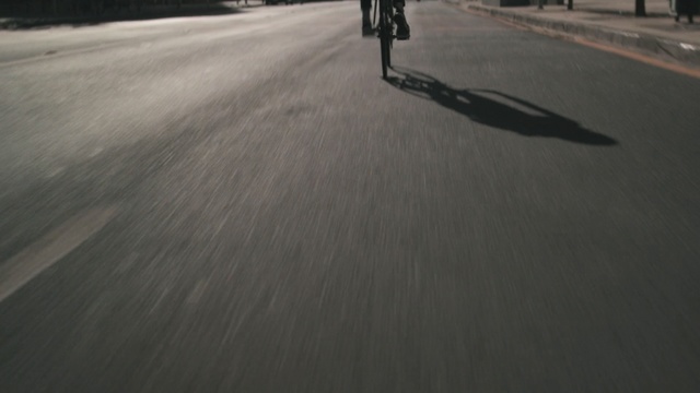 Video Reference: Asphalt, Lane, Road, Road surface, Longboard, Vehicle, Sports equipment, Recreation, Photography, Shadow