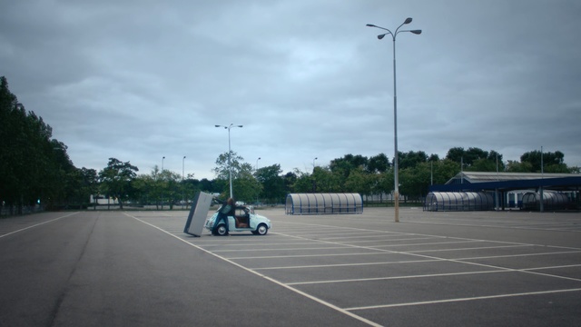 Video Reference: sky, asphalt, public space, structure, infrastructure, cloud, lane, road, road surface, parking lot