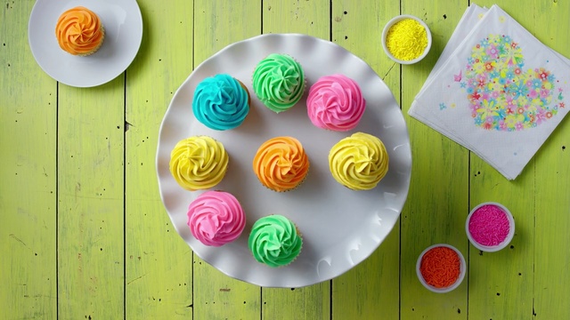 Video Reference: buttercream, icing, food additive, royal icing, sweetness, baking, confectionery, food coloring, dessert, petit four, Person