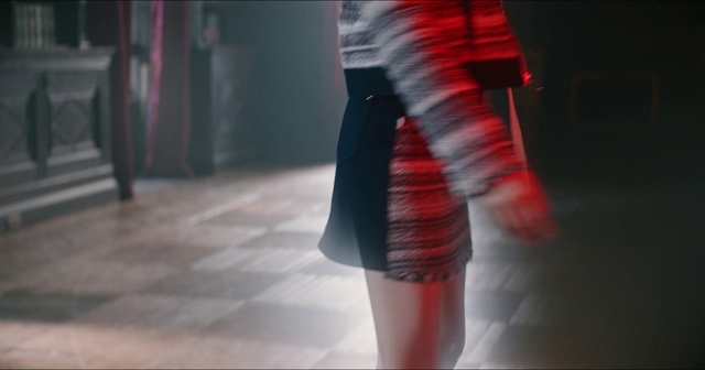 Video Reference: Red, Clothing, Light, Fashion, Pink, Leg, Snapshot, Human leg, Dress, Outerwear, Person, Woman, Holding, Wearing, Young, Man, Using, Riding, Standing, Girl, Hat, Table, Blurry, Rain, Street, White, Umbrella, Room, Dance, Skirt, Miniskirt, High heels, Fashion design, Blur