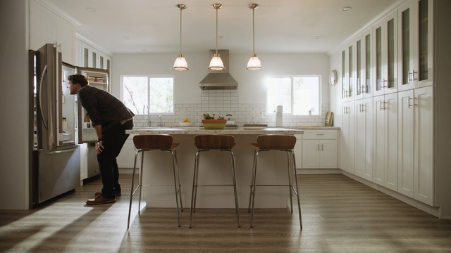 Video Reference: room, furniture, interior design, floor, flooring, wood flooring, wood, hardwood, home, table, Person