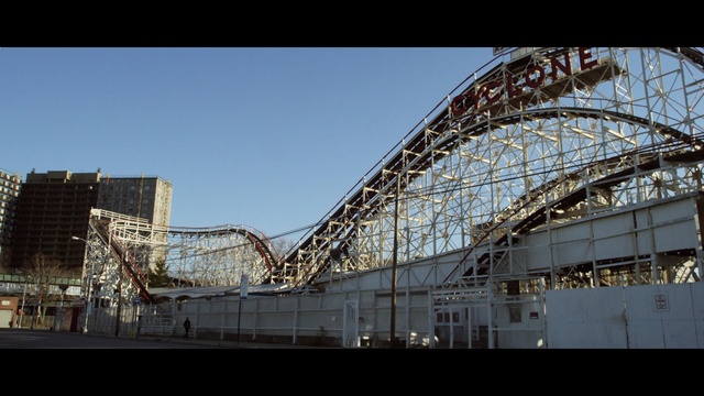 Video Reference: amusement ride, amusement park, roller coaster, sky, tourist attraction, structure, recreation, building, park, city