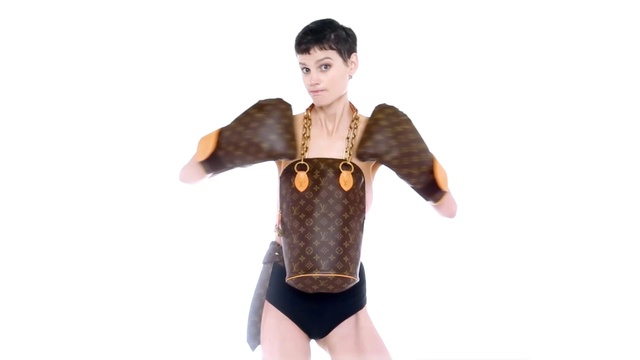 Video Reference: Clothing, Fur, Outerwear, Joint, Jacket, Sportswear, Textile, Costume, Leather, Sleeve, Person