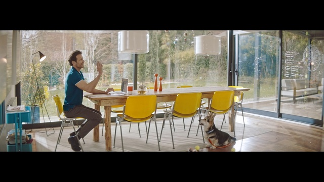 Video Reference: yellow, furniture, table, sitting, leisure, urban area, water, chair, window, glass, Person