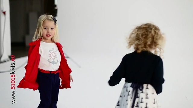 Video Reference: White, Black, Red, Clothing, Outerwear, Fashion, Child, Shoulder, Toddler, Standing, Person