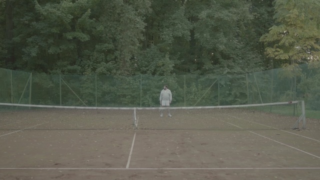 Video Reference: tennis court, net, tennis, sport venue, structure, sports, racquet sport, soft tennis, grass, area