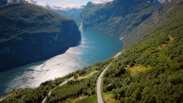 Video Reference: Mountainous landforms, Natural landscape, Fjord, Mountain, Nature, Highland, Mountain range, Water resources, Sky, Wilderness