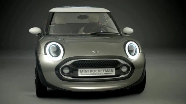 Video Reference: car, motor vehicle, vehicle, mini, mini e, automotive design, city car, mini cooper, automotive exterior, hardware, Person