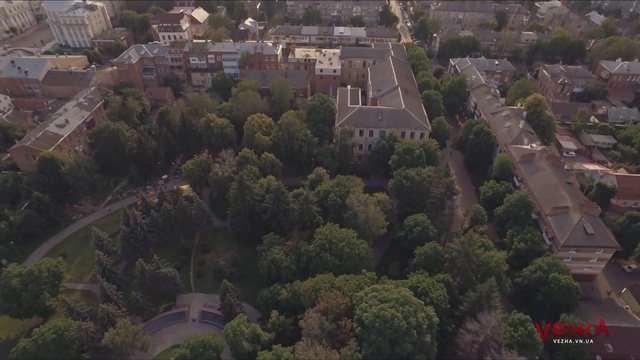 Video Reference: Aerial photography, Birds-eye view, Residential area, Suburb, Urban area, Human settlement, Photography, Urban design, Metropolitan area, Landscape