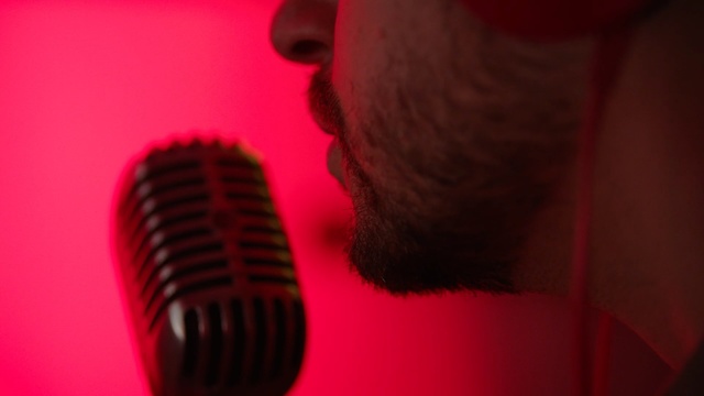 Video Reference: red, microphone, audio, light, audio equipment, close up, darkness, macro photography