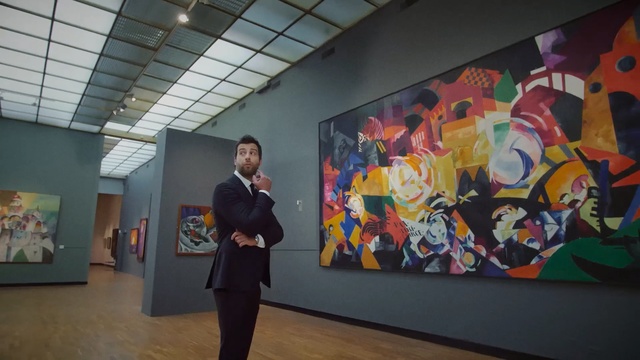 Video Reference: art, exhibition, art exhibition, modern art, art gallery, tourist attraction, painting, museum, mural, art dealer, Person