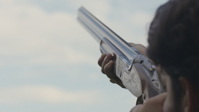Video Reference: Gun, Firearm, Shooting sport, Clay pigeon shooting, Shooting, Shotgun, Sky, Recreation, Gunshot, Hand, Person