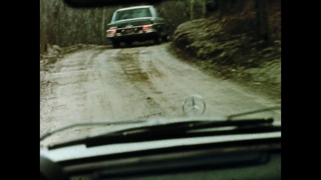 Video Reference: Land vehicle, Vehicle, Car, Off-roading, Regularity rally, Mode of transport, Automotive exterior, Road, Dirt road, Driving