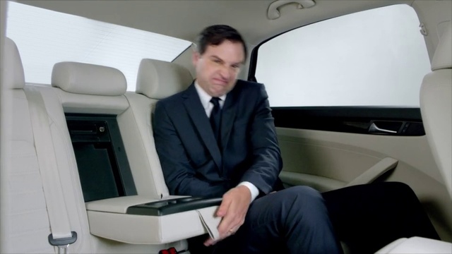 Video Reference: Luxury vehicle, Automotive design, Vehicle, Head restraint, Car, Mid-size car, Car seat, Businessperson, Vehicle door, Person